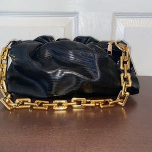 Black faux reptile skin clutch bag